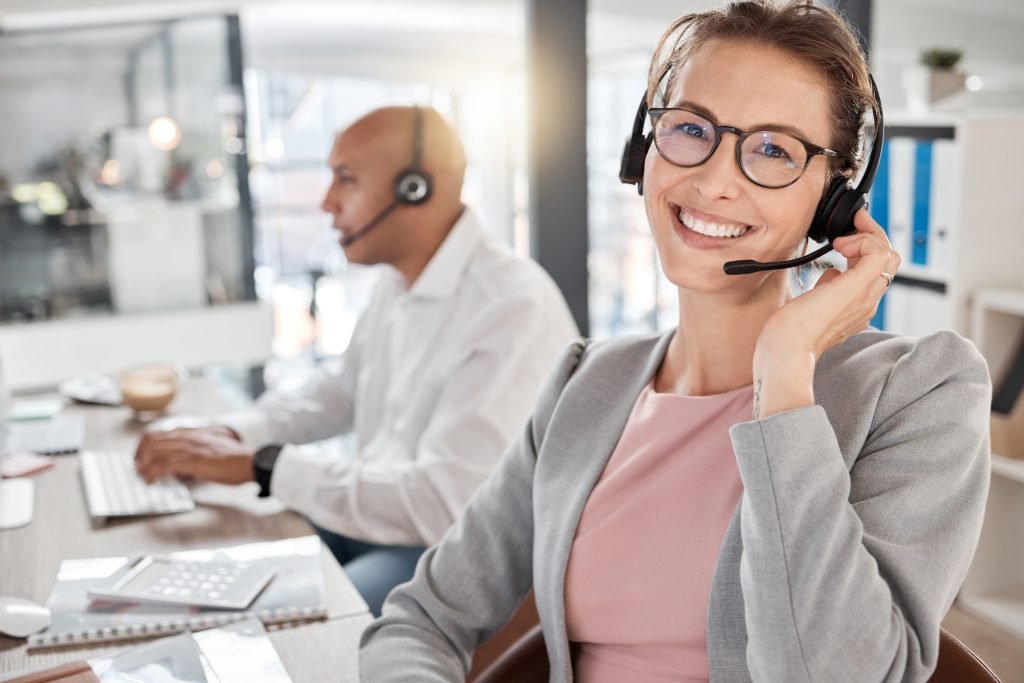 Call center, happy and consultant portrait in office for telemarketing, communication and contact u